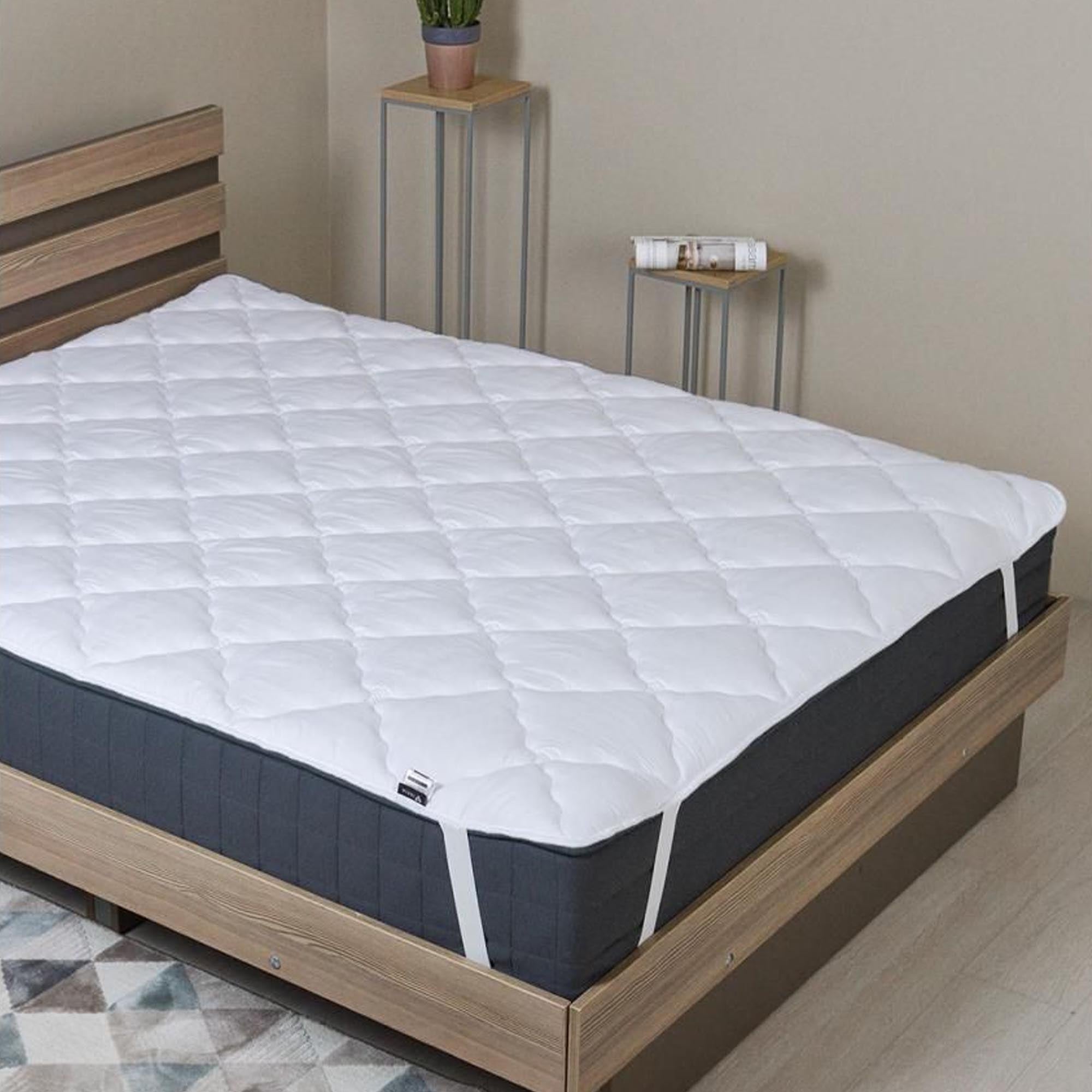 Наматрацник стьобаний з резинками по кутах